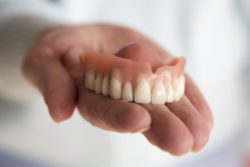 Dental Implants vs Dentures North Liberty IA